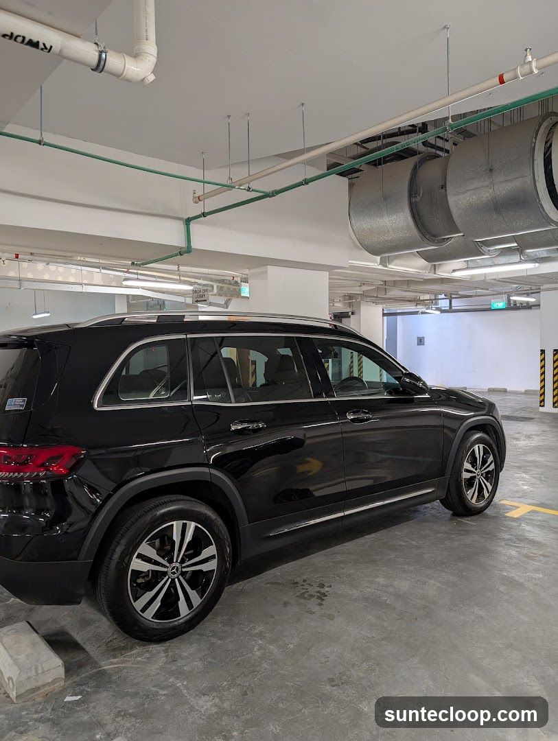 Black Mercedes-Benz SUV in Parking Garage