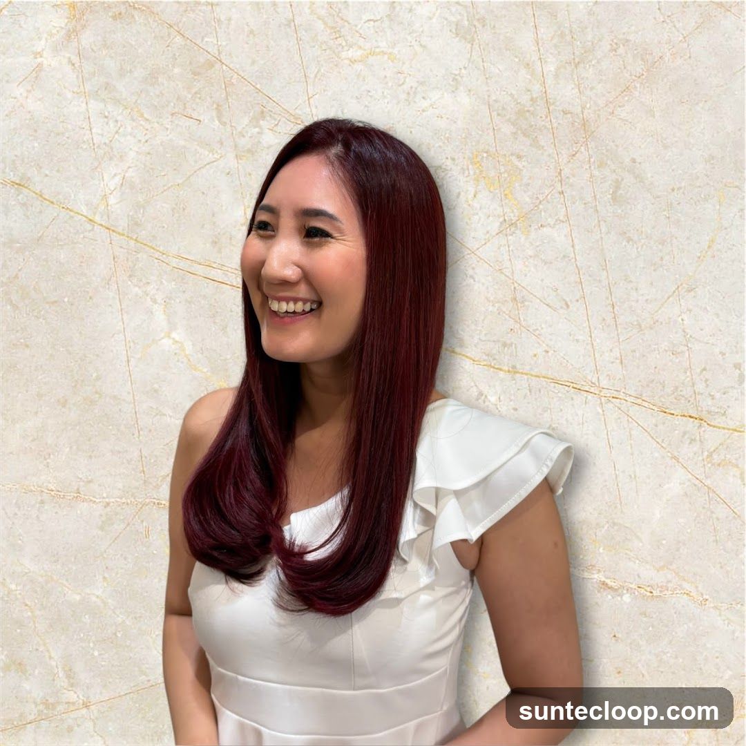 Woman with dark red hair