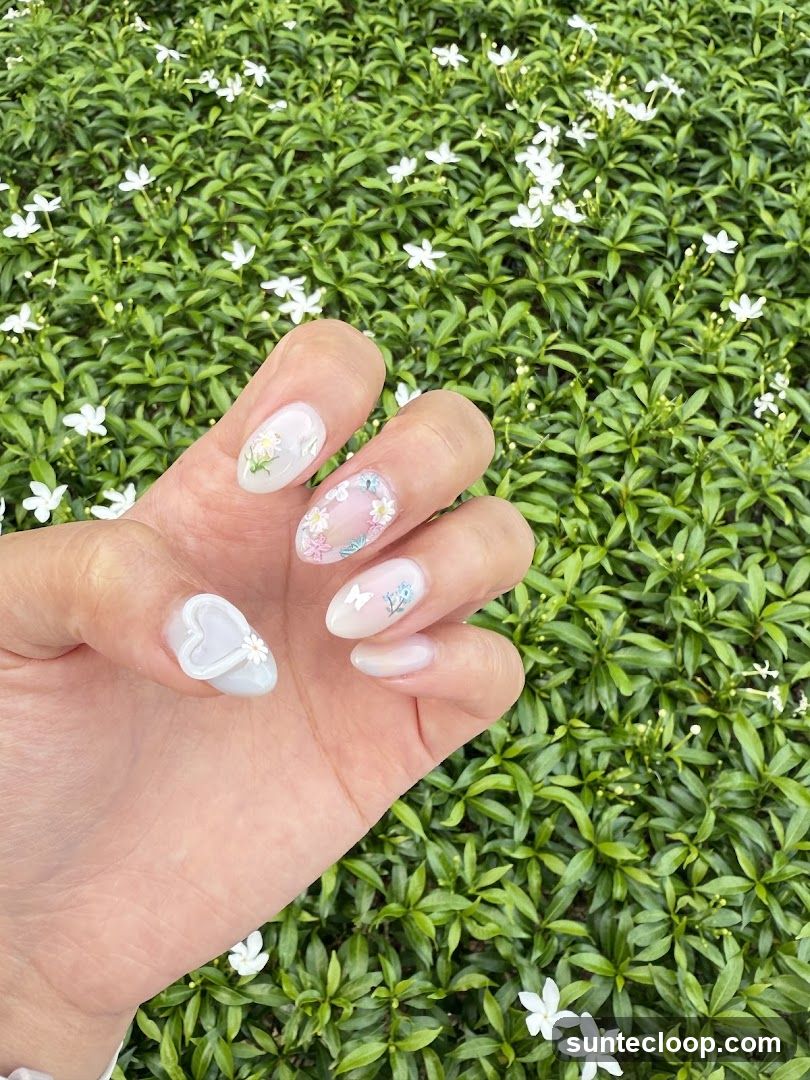 Nail Art with Floral and Butterfly Designs