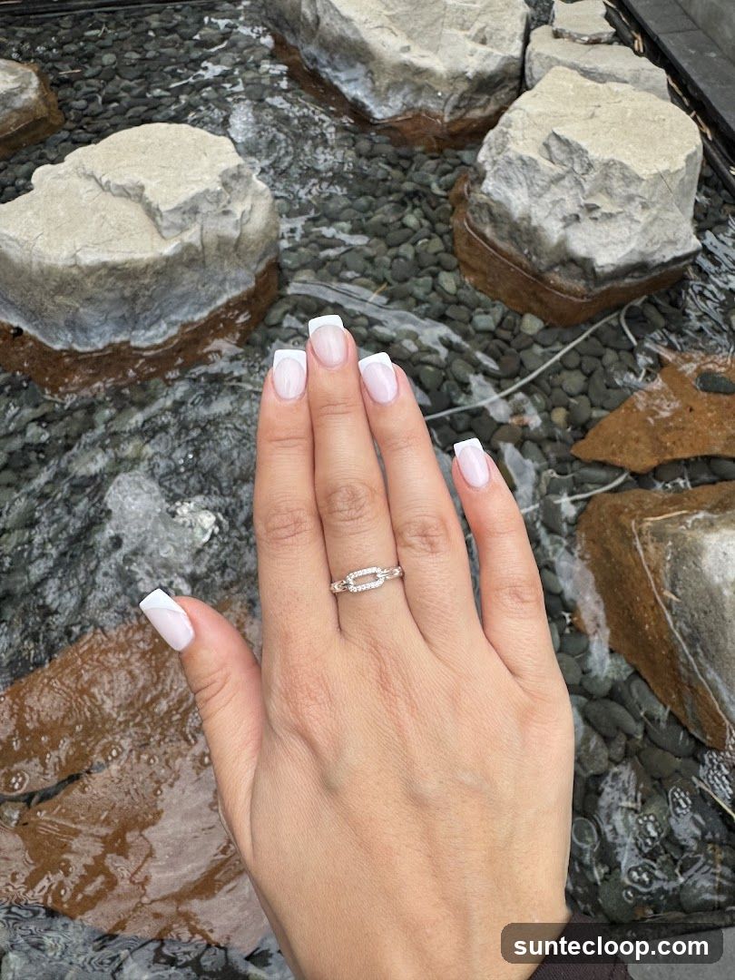 Hand with French Manicure and Ring