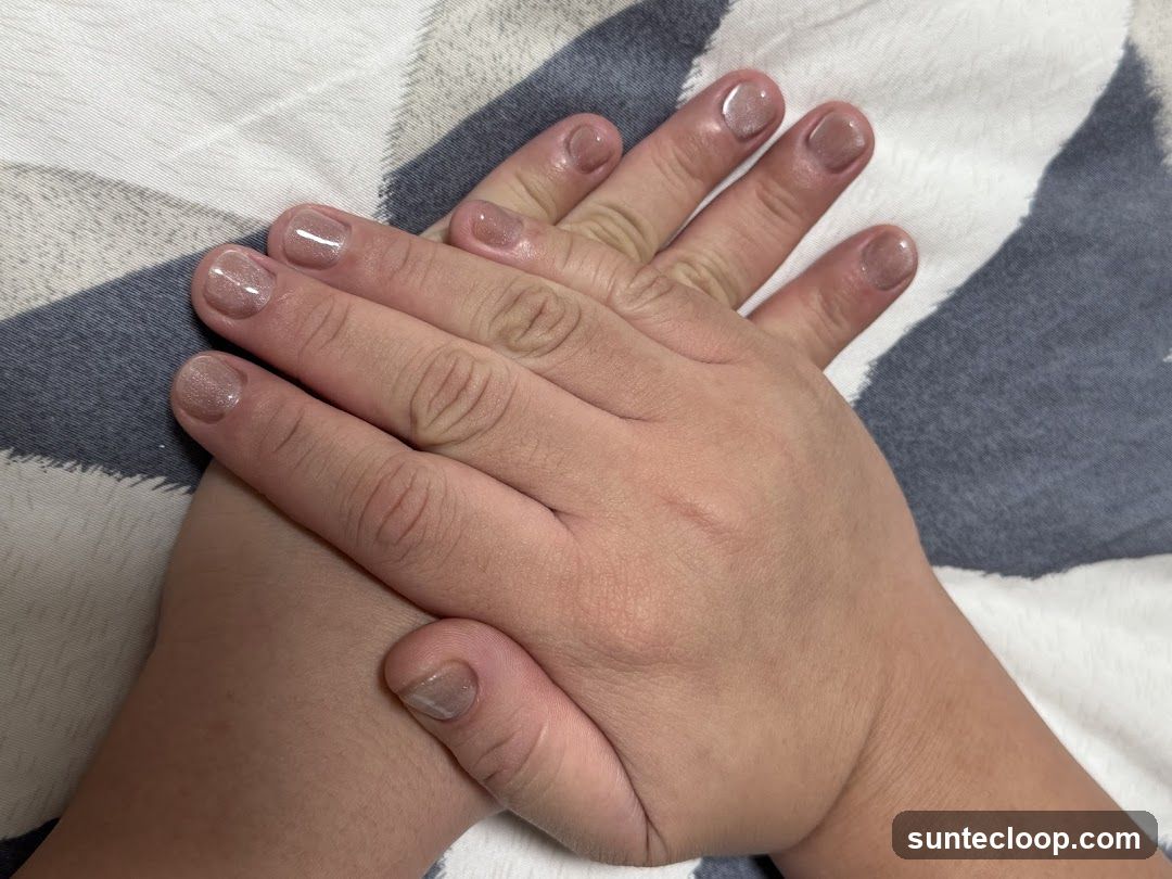 Hands with light brown nails