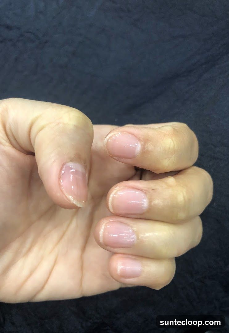 Close-up of a hand with natural nails