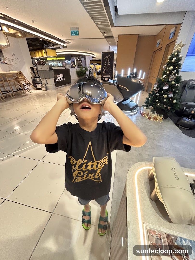 Boy trying on VR goggles in a store