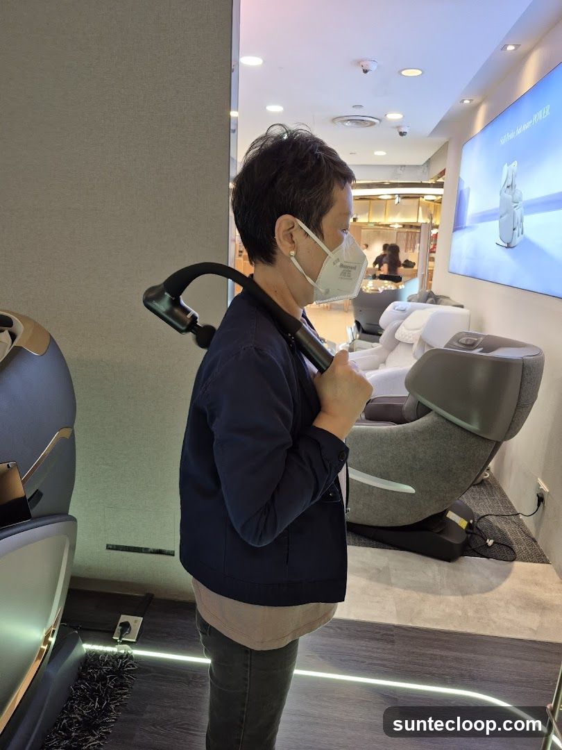 Woman holding a massage gun