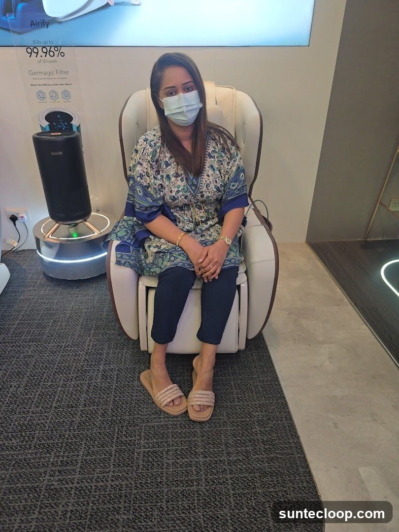 Woman sitting in a massage chair