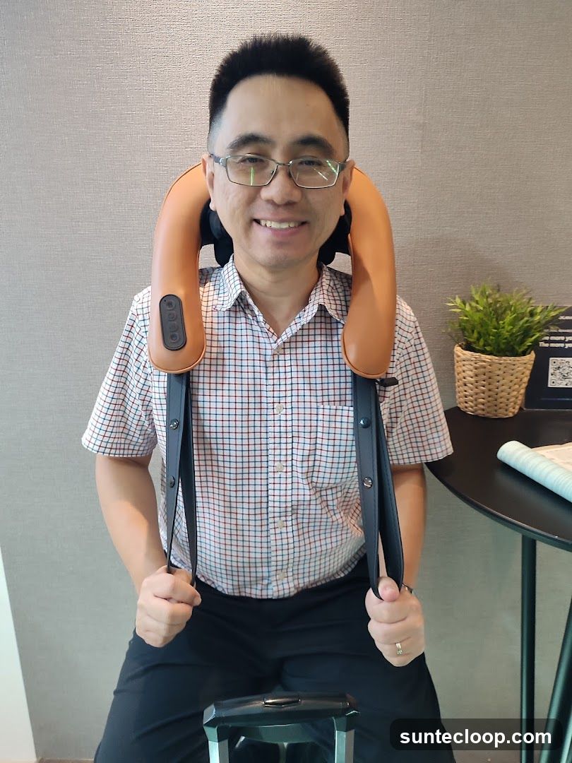 Man wearing a neck massager