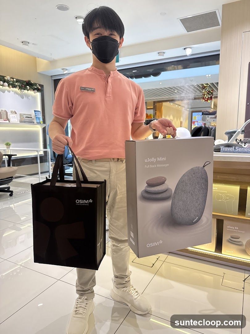 Man holding OSIM products