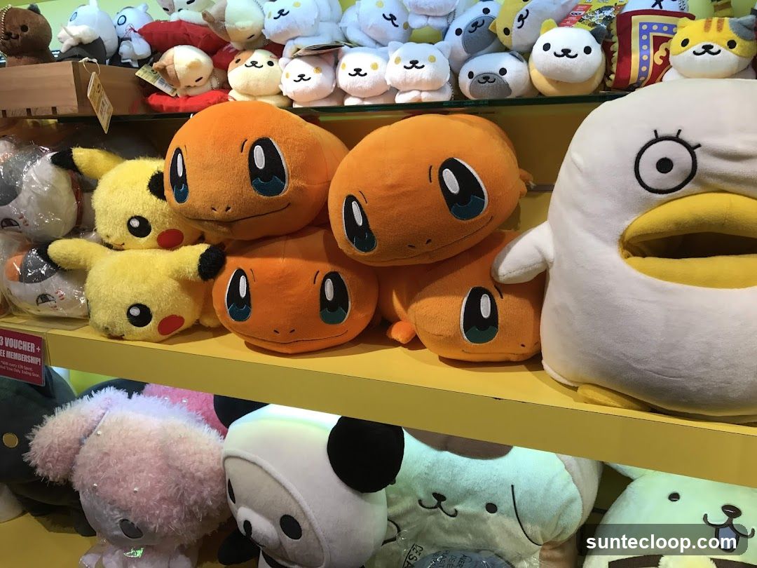 Pokemon and other plush toys on display