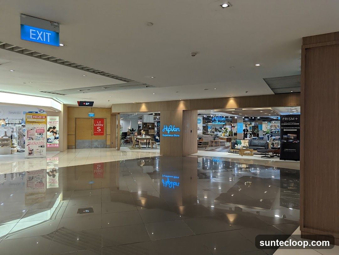 Interior of a shopping mall with store fronts