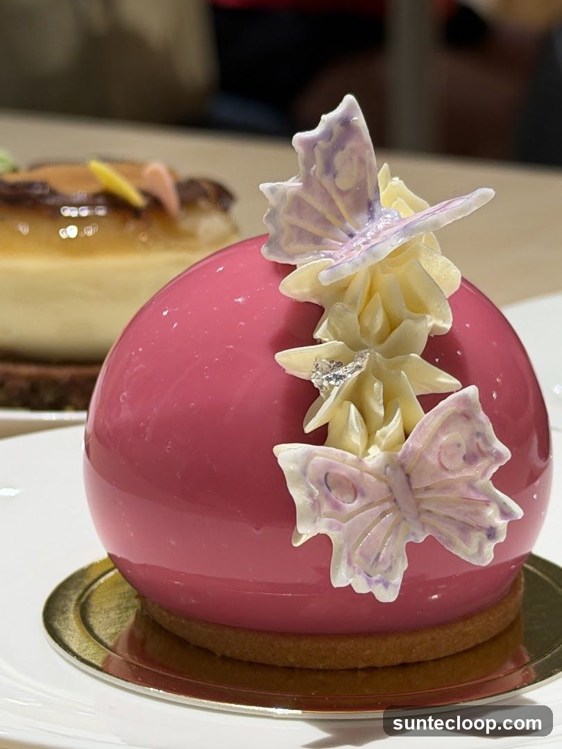 Pink Mousse Cake with Butterfly Decoration