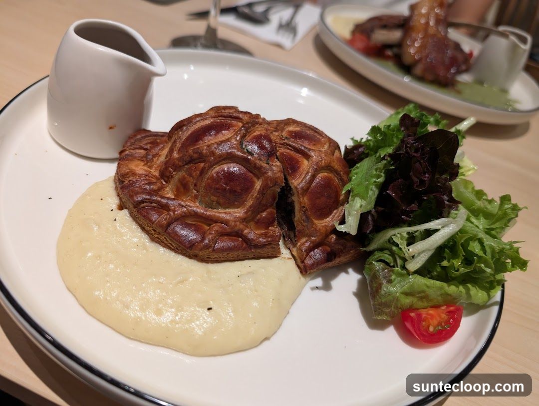 Beef Wellington with Mashed Potatoes and Salad
