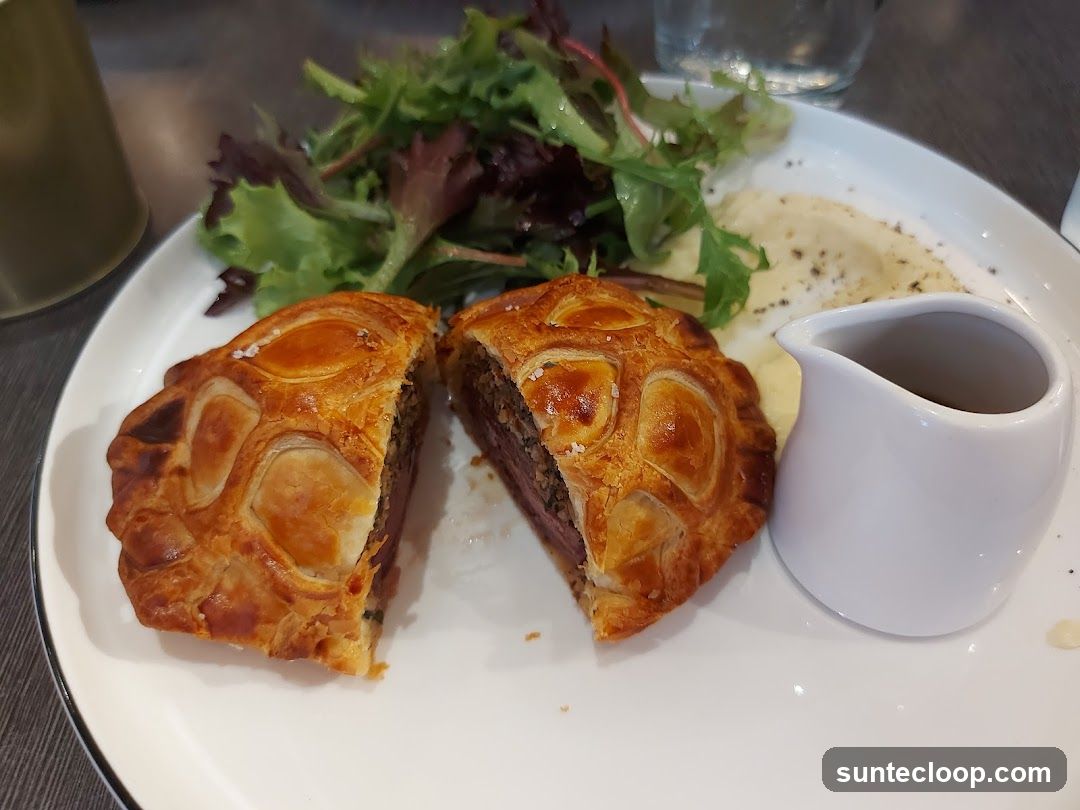Beef Wellington with Mashed Potatoes and Salad