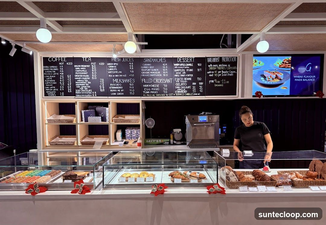 Cafe Counter with Menu and Pastries
