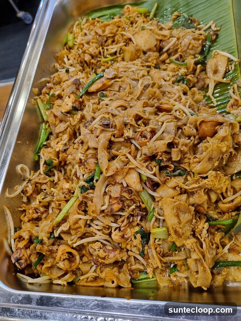 Stir-fried noodles with vegetables and seafood