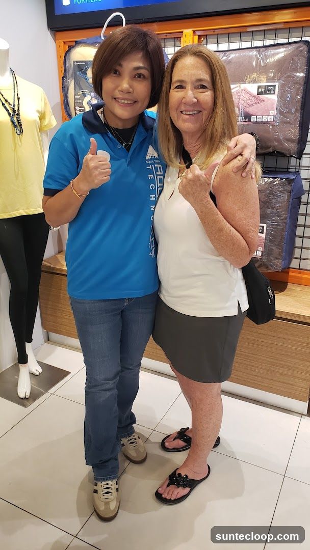 Two Women Posing in a Store