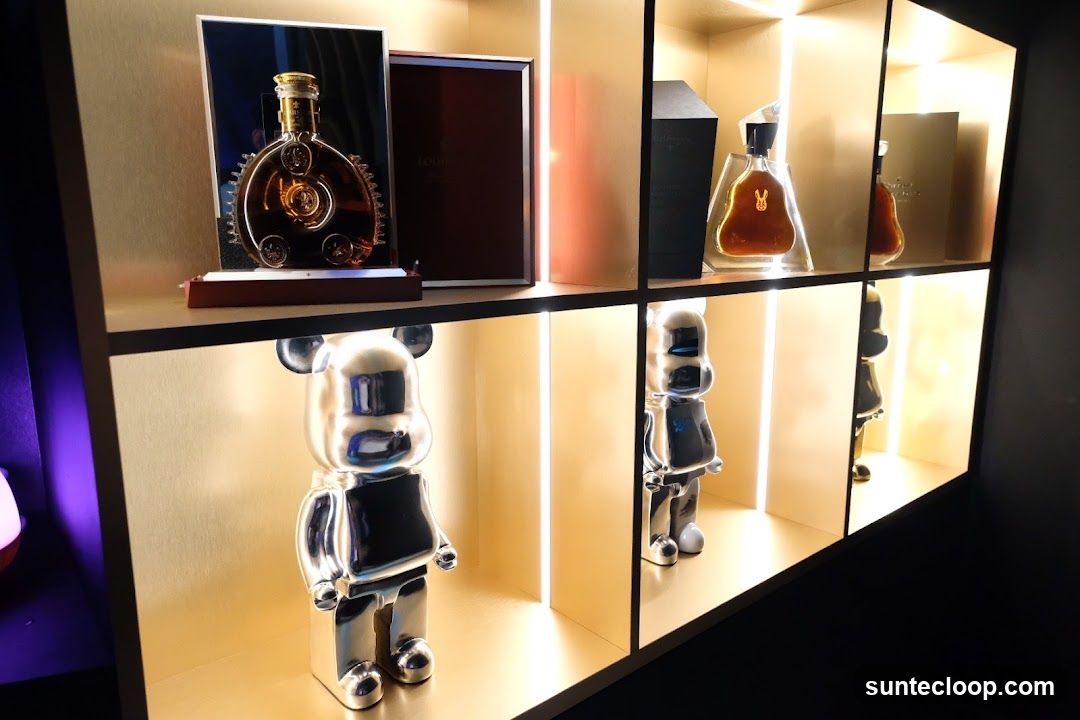 Display of Liquor Bottles and Collectible Figures
