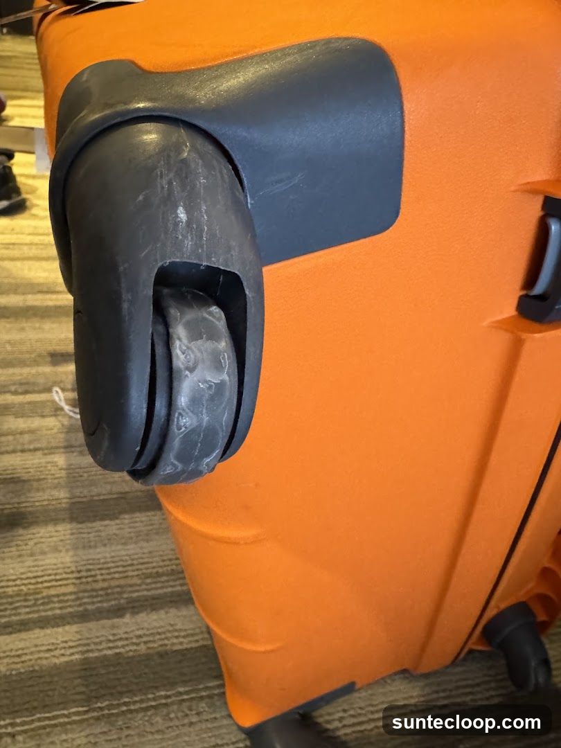 Orange Suitcase Wheel