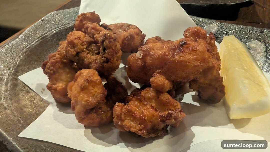 Fried Chicken Bites with Lemon Wedge