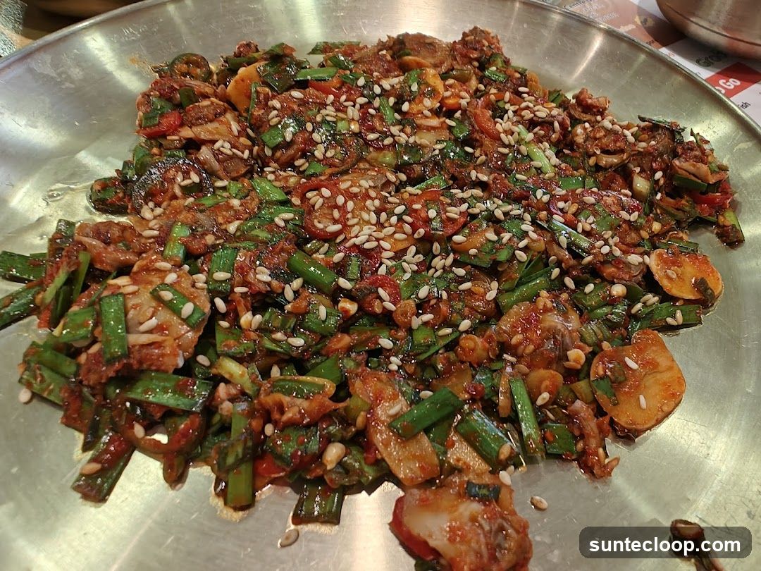 Spicy Stir-Fried Dish with Sesame Seeds