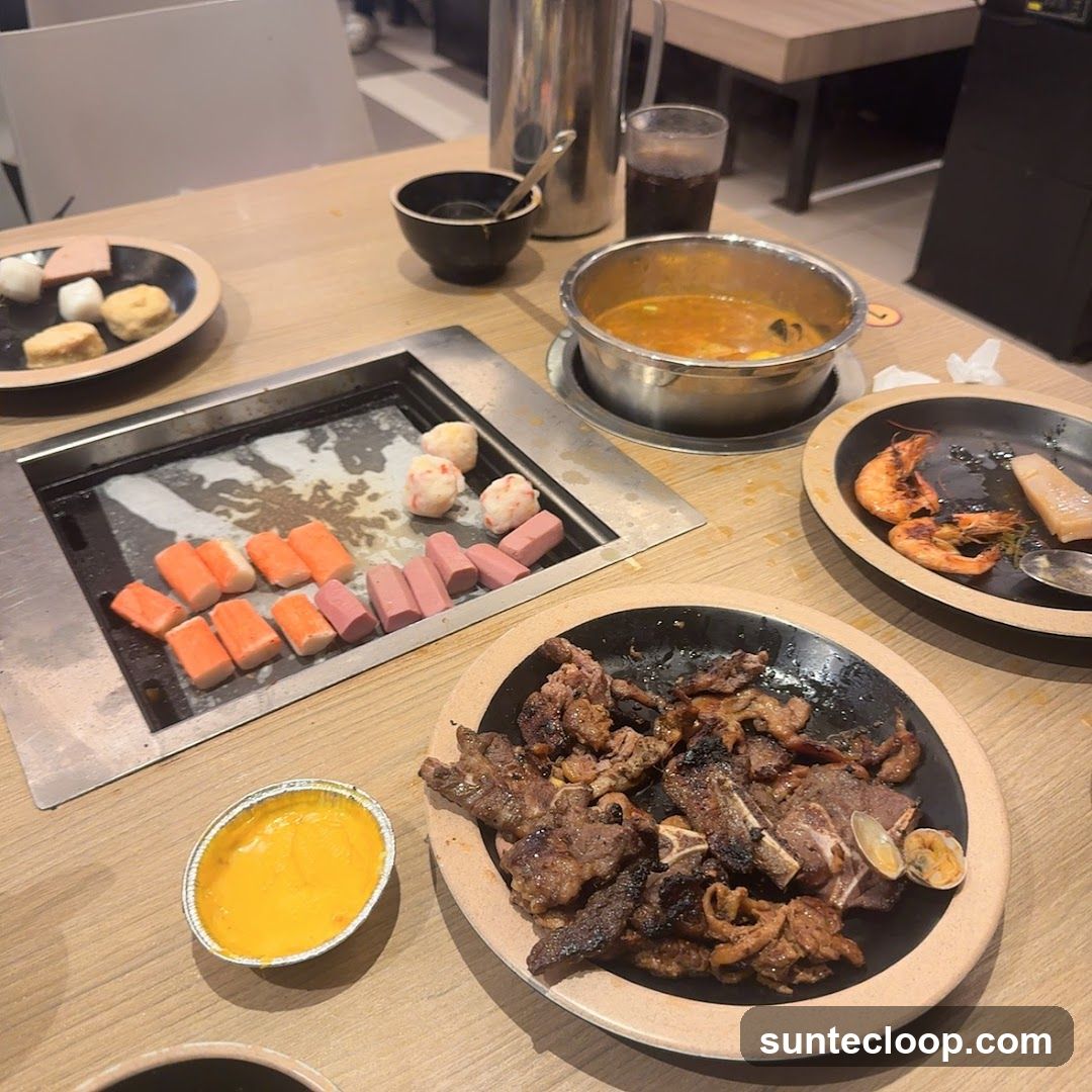 Table with Korean BBQ and Hot Pot Ingredients