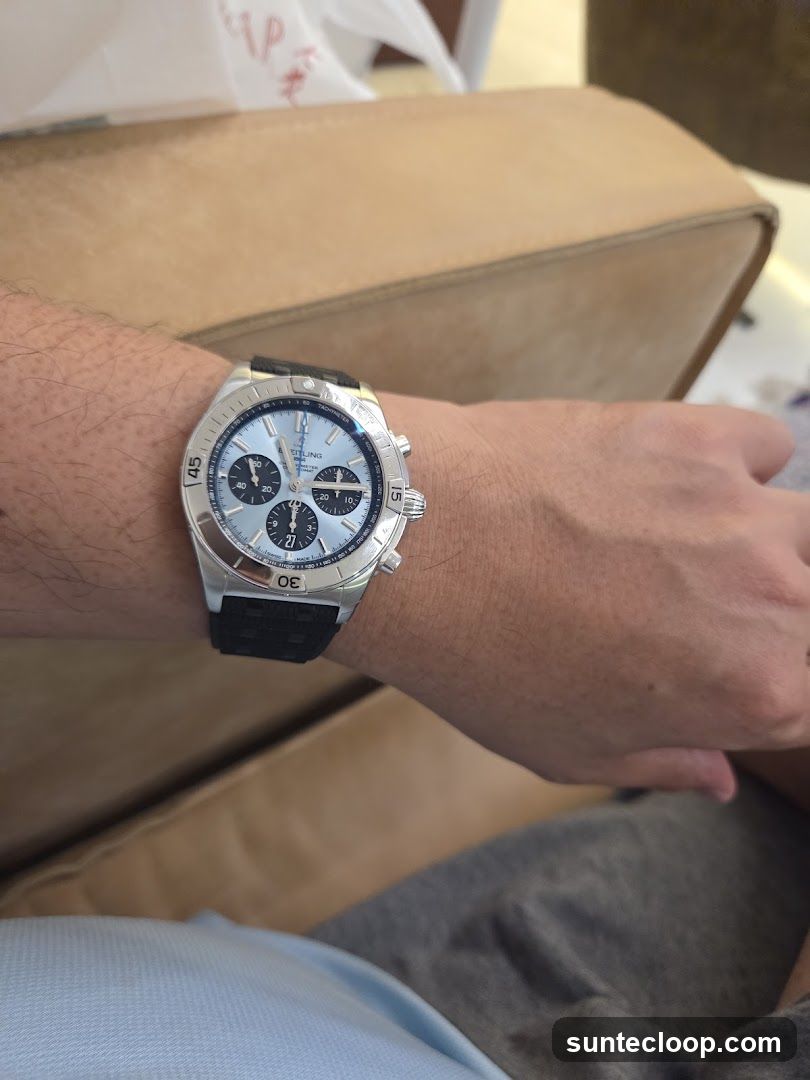 Man wearing a Breitling watch