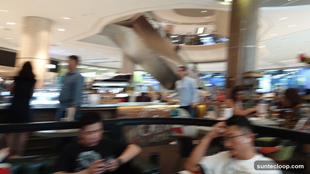 People in a busy indoor space