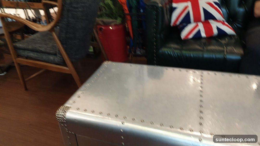 Interior seating area with Union Jack pillows