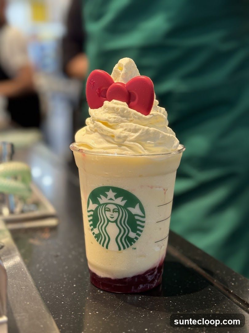 Starbucks Drink with Hello Kitty Topping