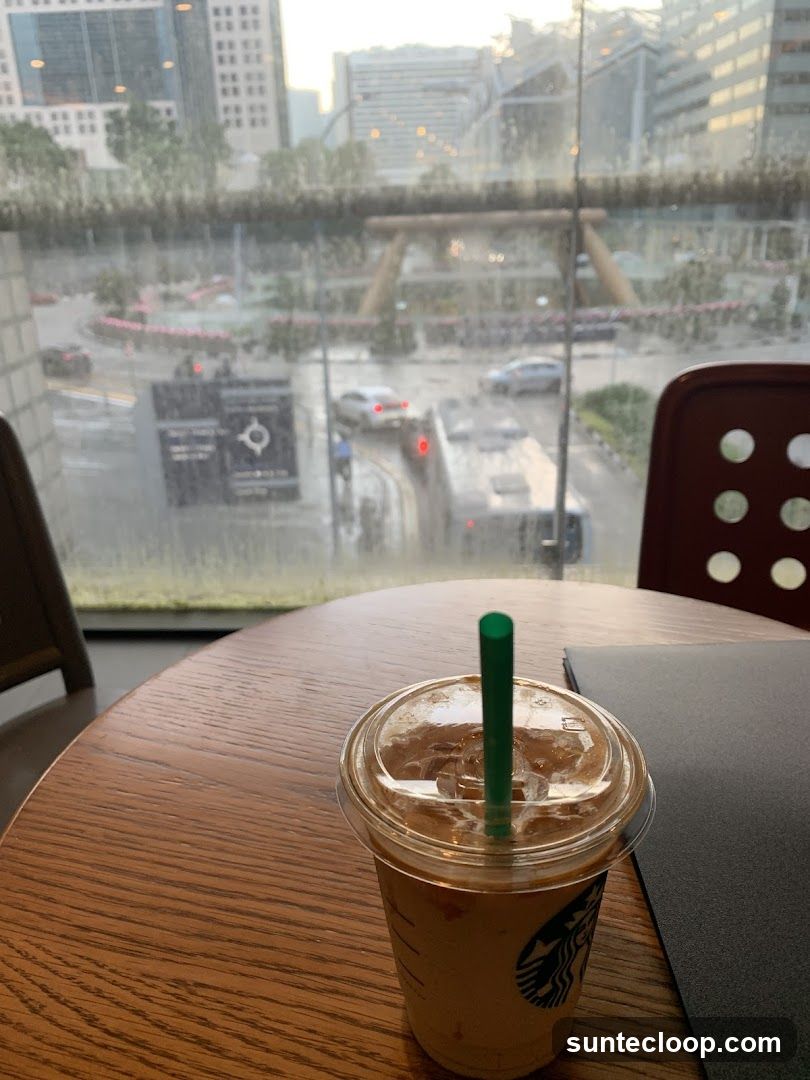 Iced Coffee on Table with City View