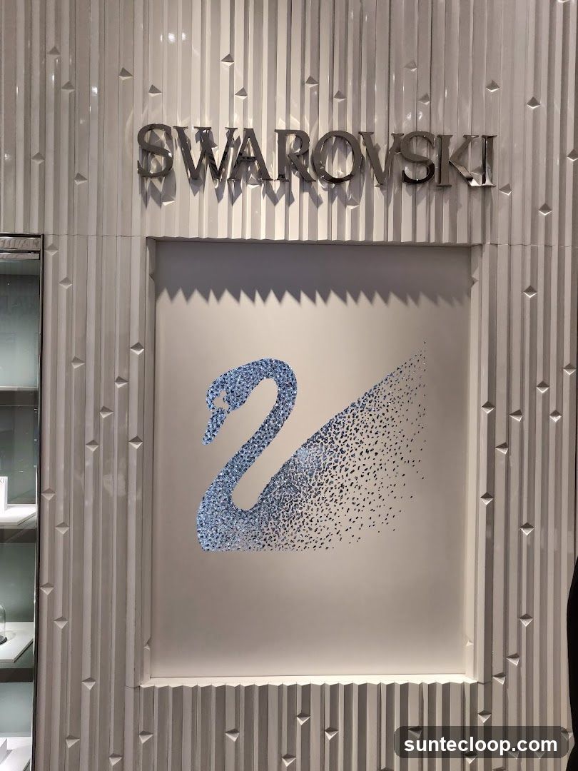 Swarovski Logo and Swan Art