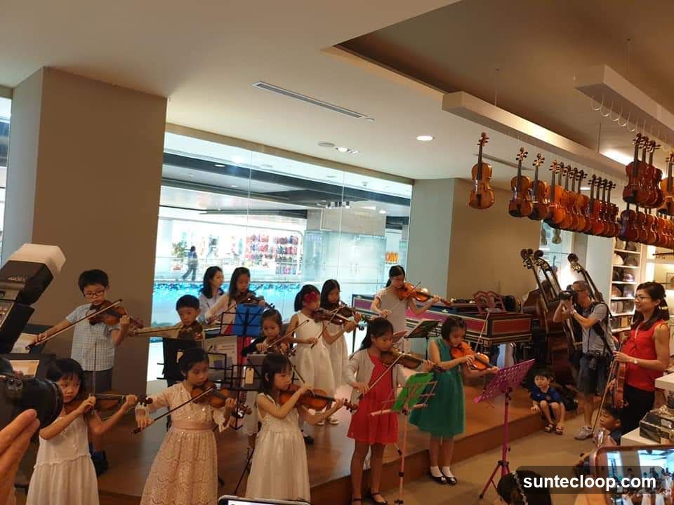 Children playing violins