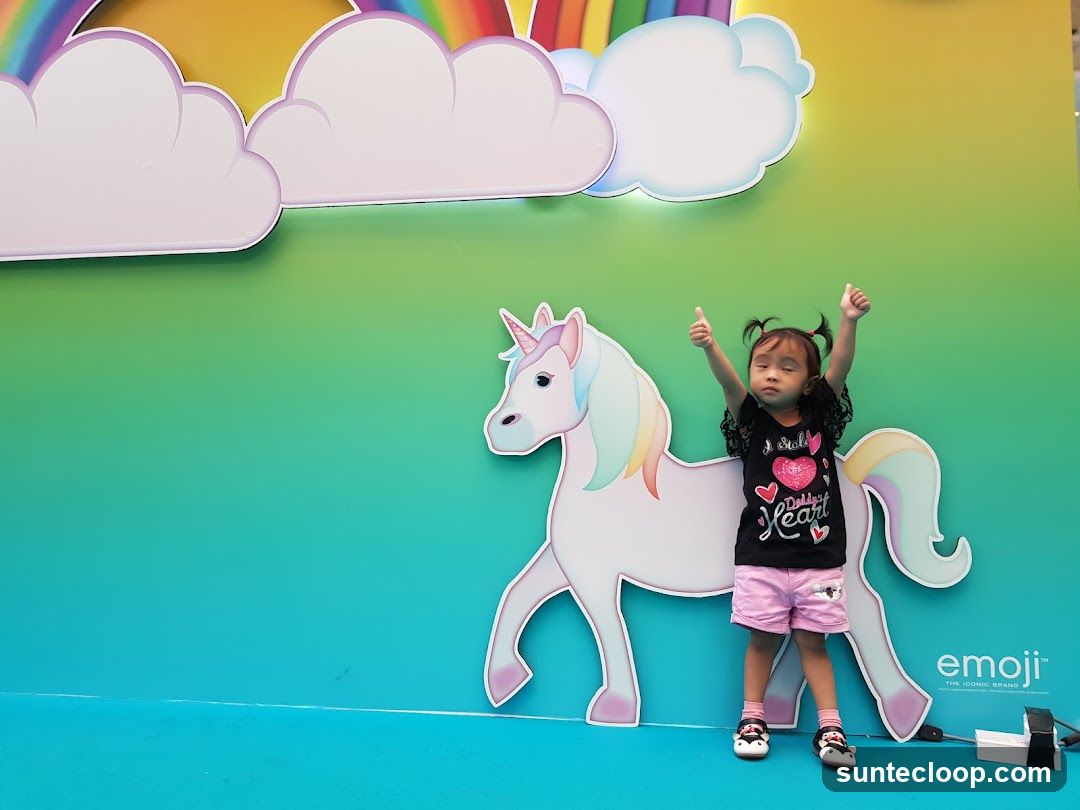 Child Posing with Unicorn Decoration