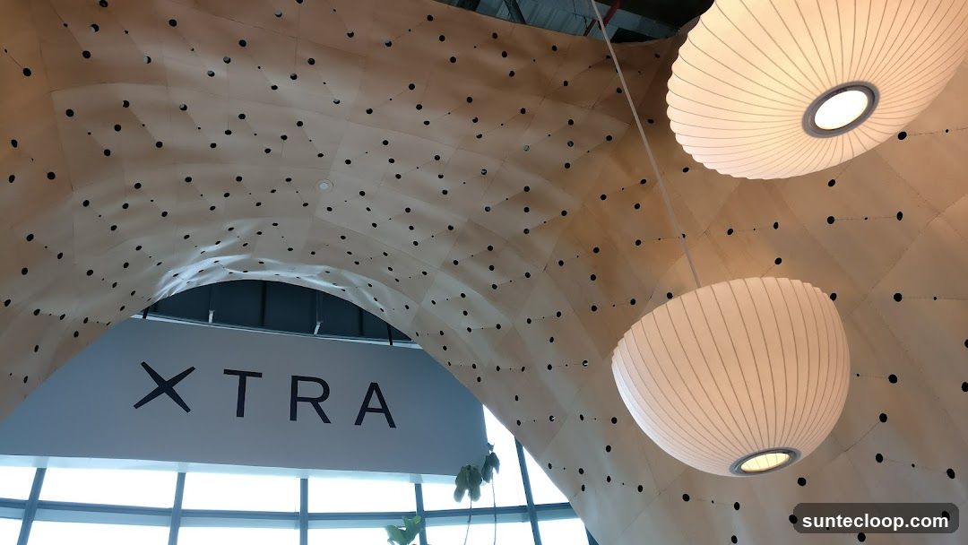 Interior with "XTRA" Signage and Pendant Lights