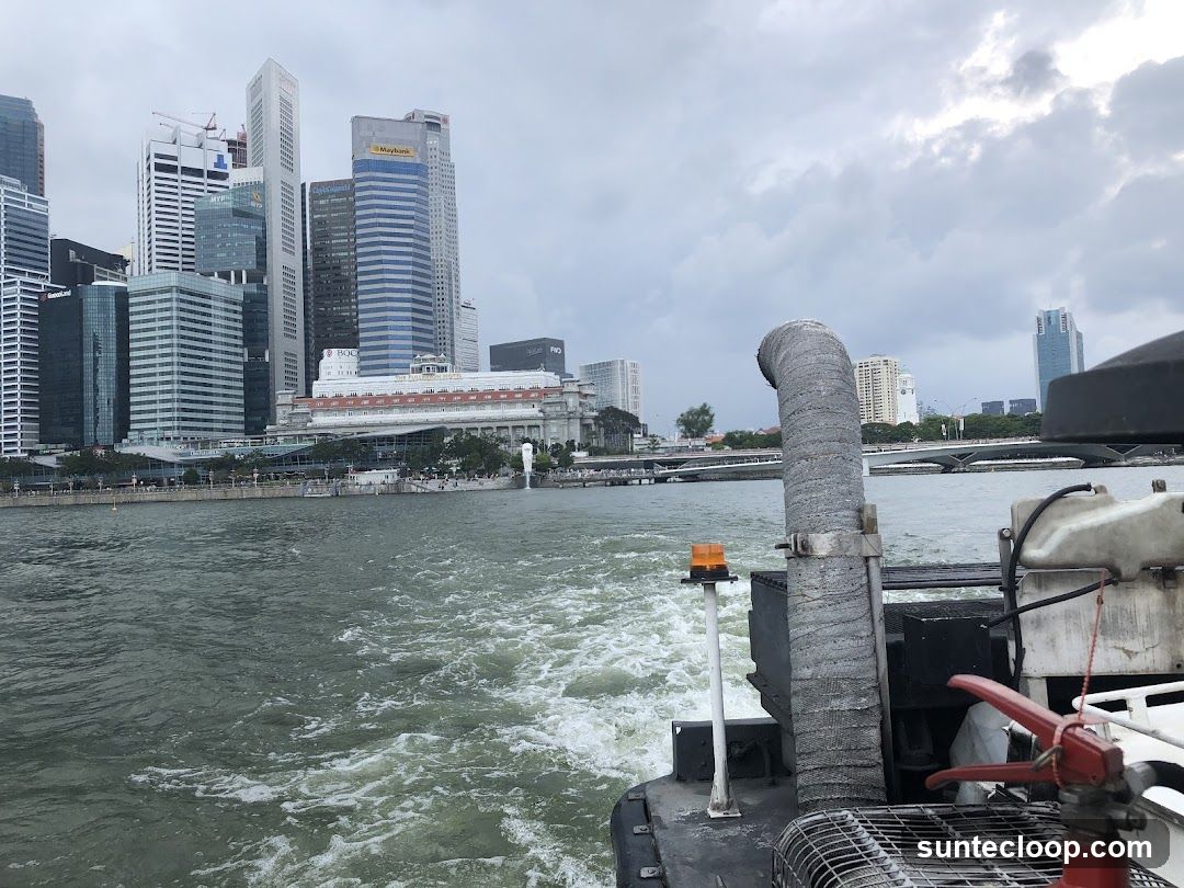 Boat Wake with City Skyline