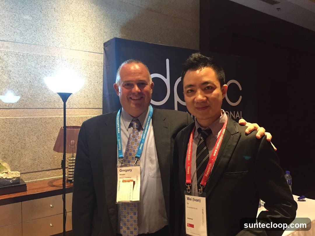 Two men at a conference