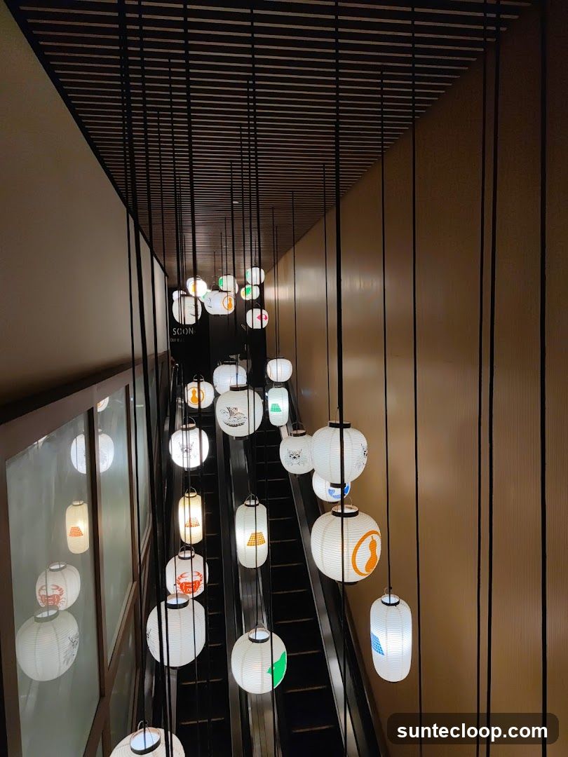 Japanese Lanterns Hanging Above Escalator