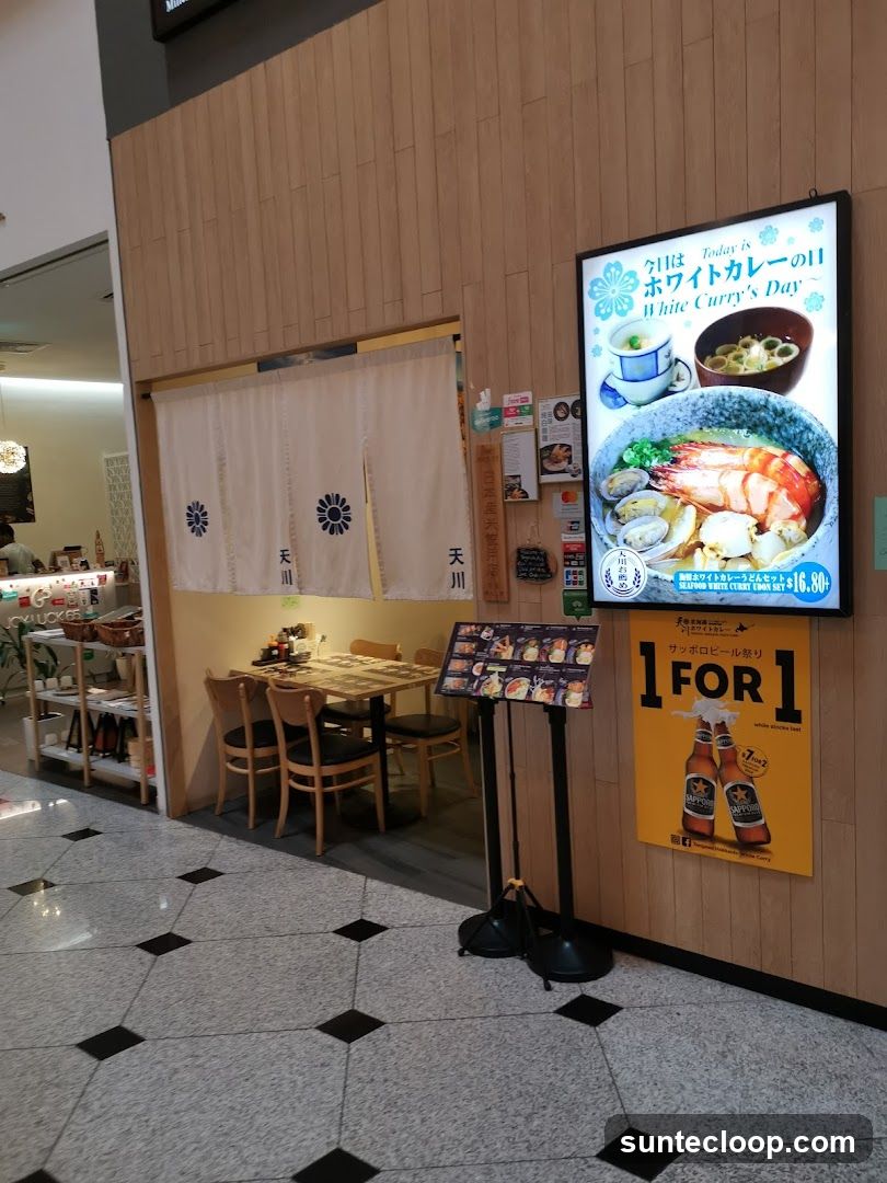 Restaurant Entrance with Menu and Advertisement