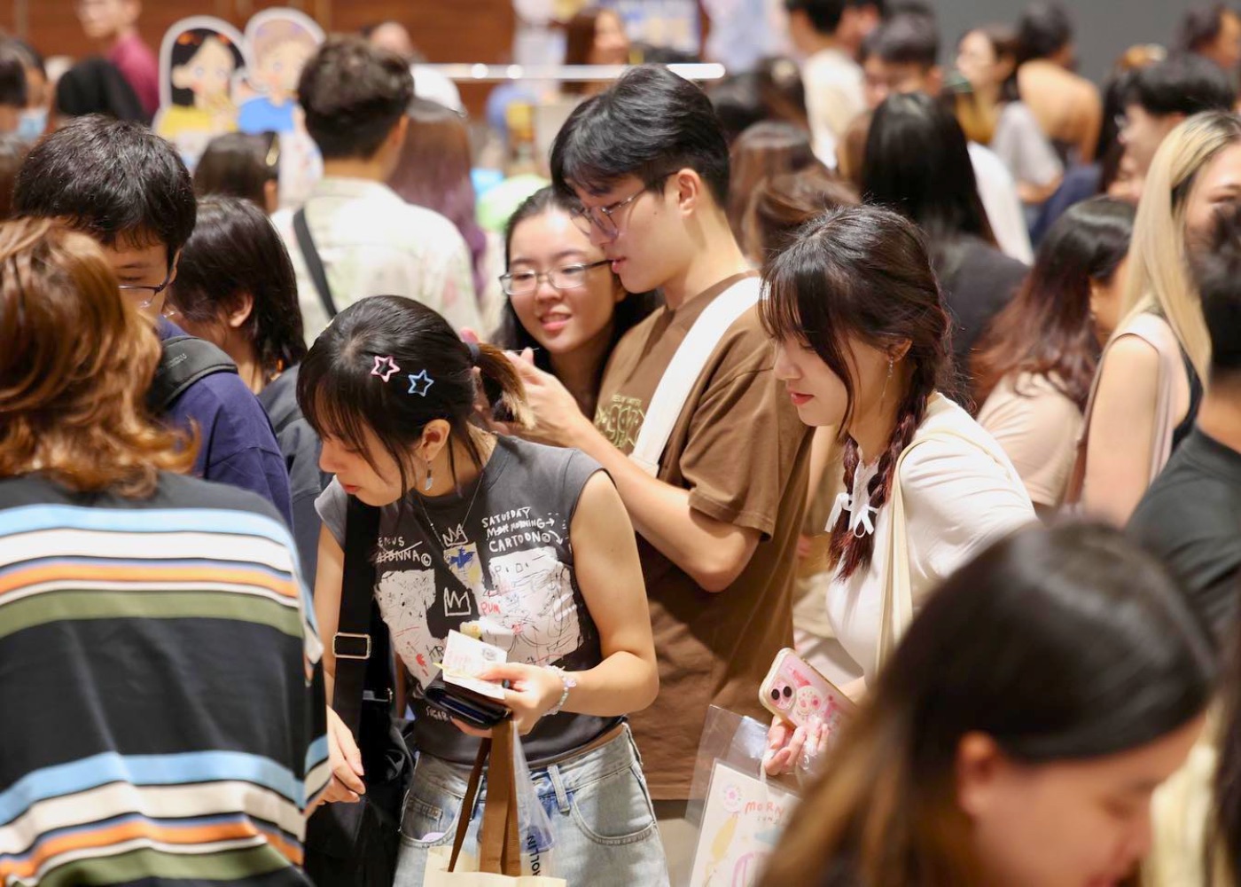 Crowded aisles at Public Garden inside Suntec Singapore convention halls